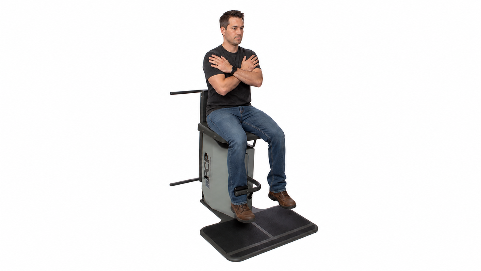 A participant completing a seated strength measurement with the current grey Physical Capacity Profile testing system